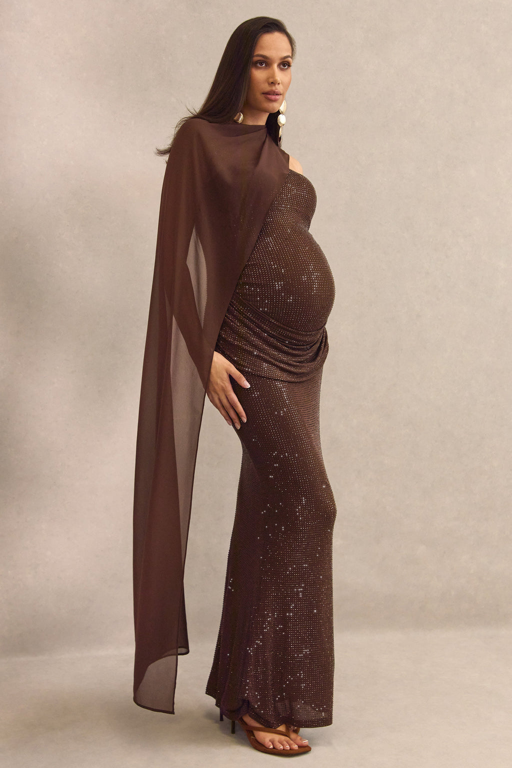 Ottoline | Dark Brown Hotfix Asymmetric-Neck Maternity Maxi Dress With Sheer Cape Detail